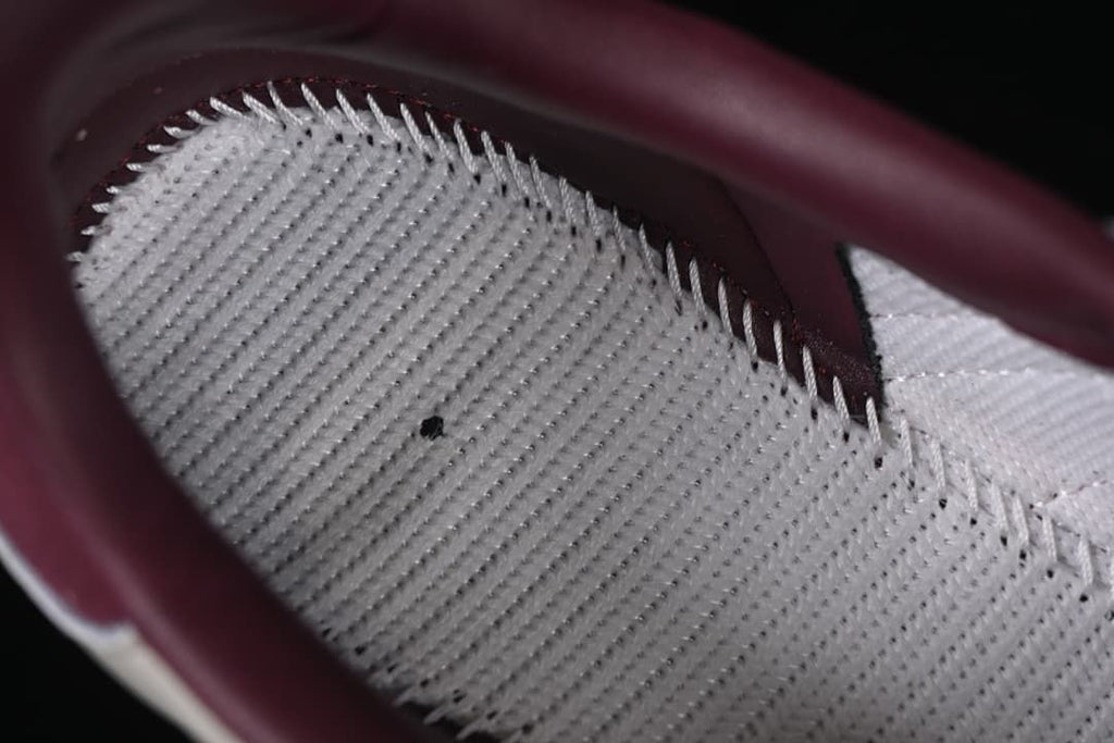 Close-up of the sneaker interior, showing the lining and insole edge.
