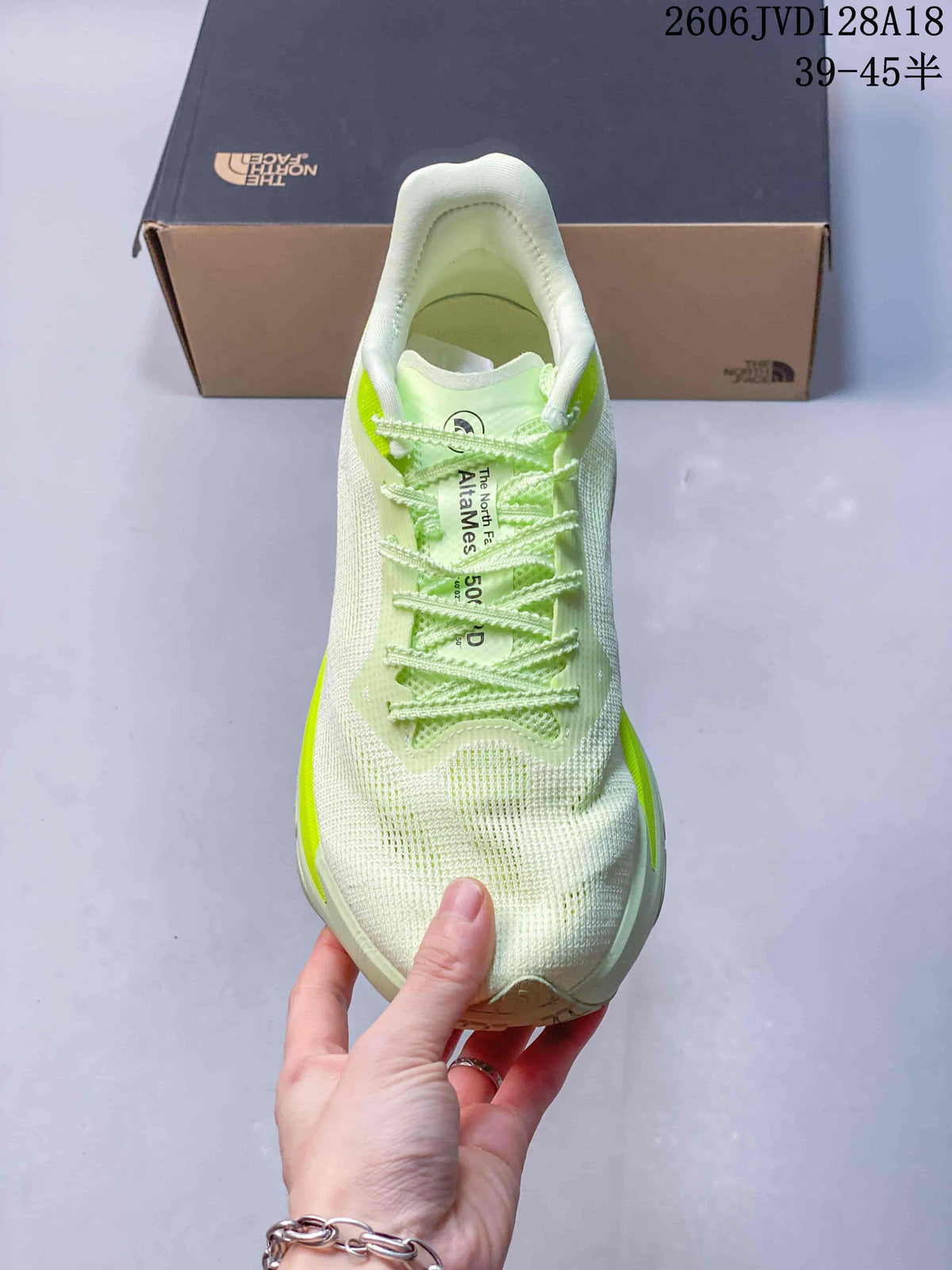 Top view of the lace-up shoe with padded collar and lime details