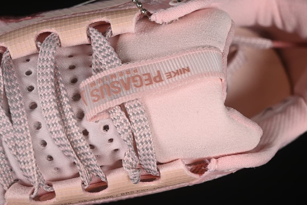 Close-up of the tongue, patterned laces and lace eyelets