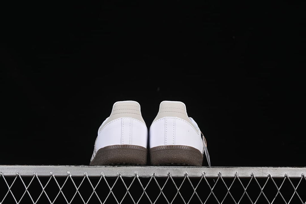 Rear view of the pair showing heel panels and brown outsoles