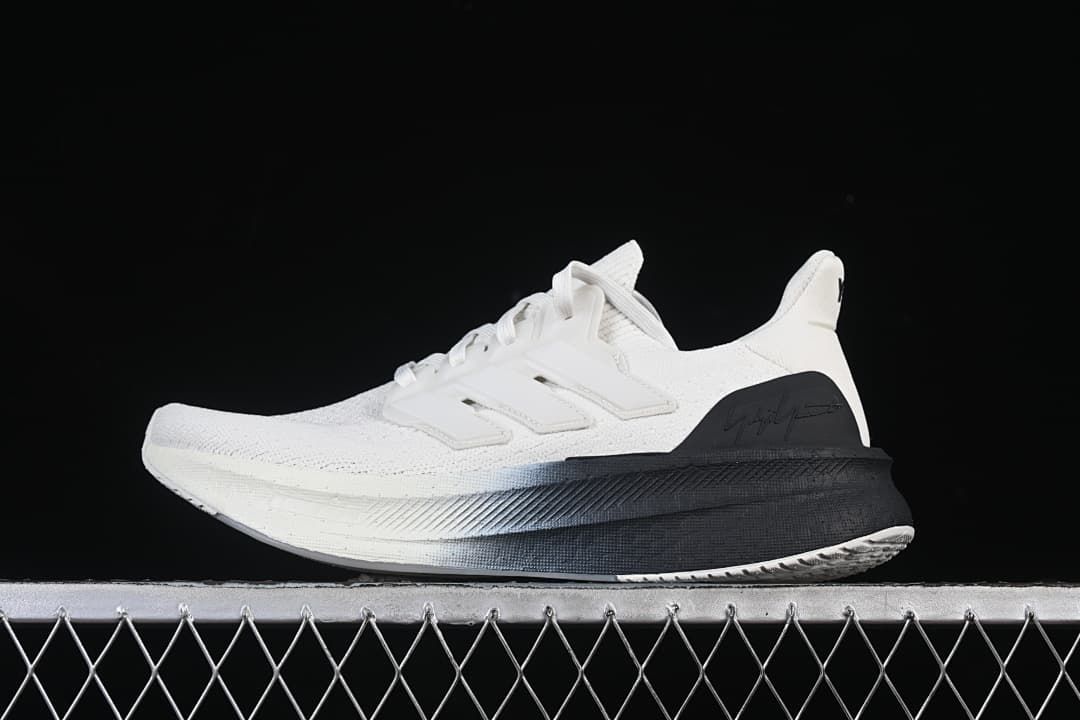 White and black Adidas Ultraboost 5 Y-3 shoe, side view