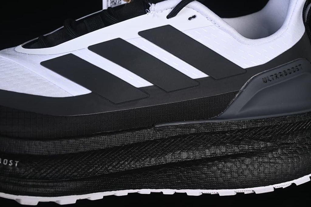 Close-up of the side stripes, heel detail, and midsole