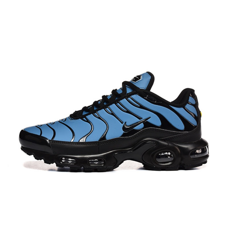 Blue and black Nike Air Max Plus sneaker with visible air units.
