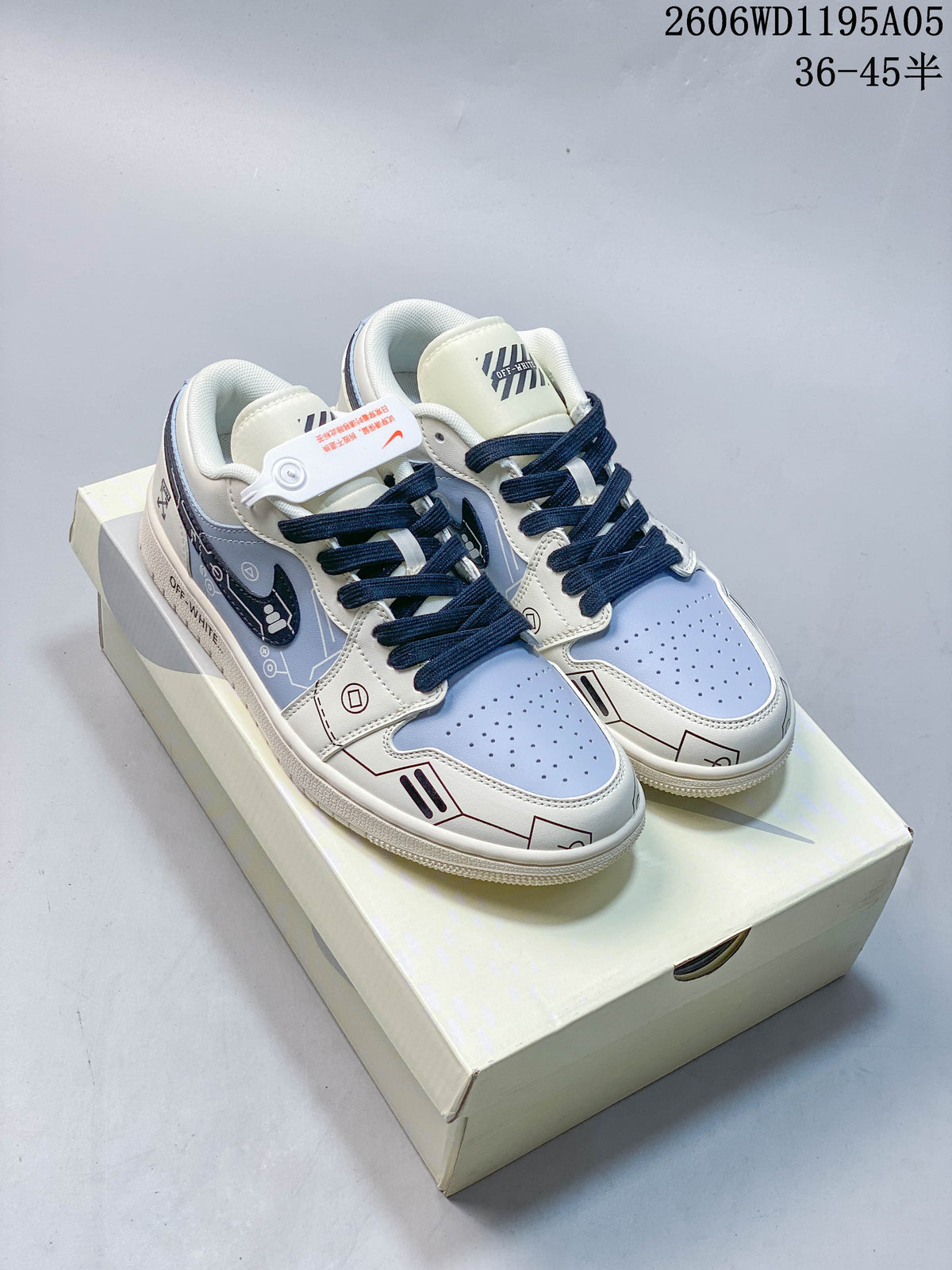 Pair of white and pale blue graphic low-top sneakers with navy laces displayed on a box