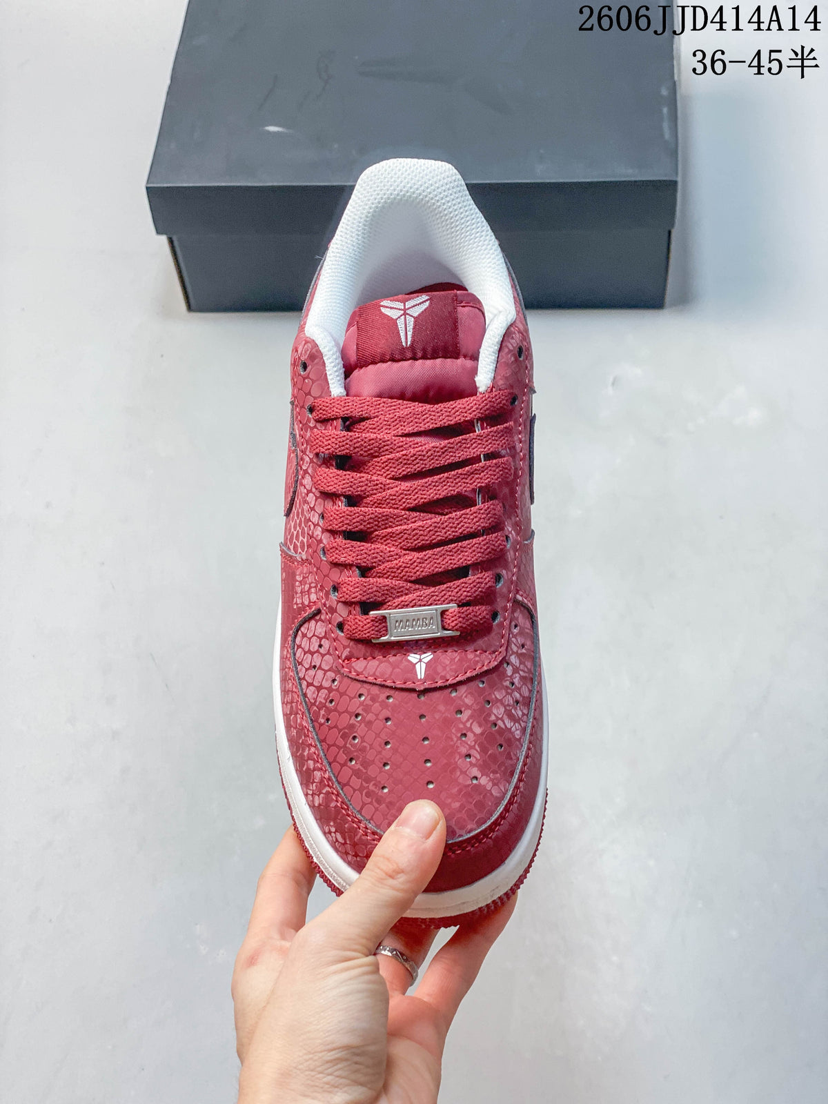 Top view showing the perforated toe, red laces, and patterned upper