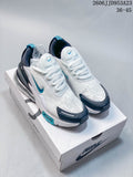 White and teal Nike Air Max 270 sneakers shown from above on a shoe box.