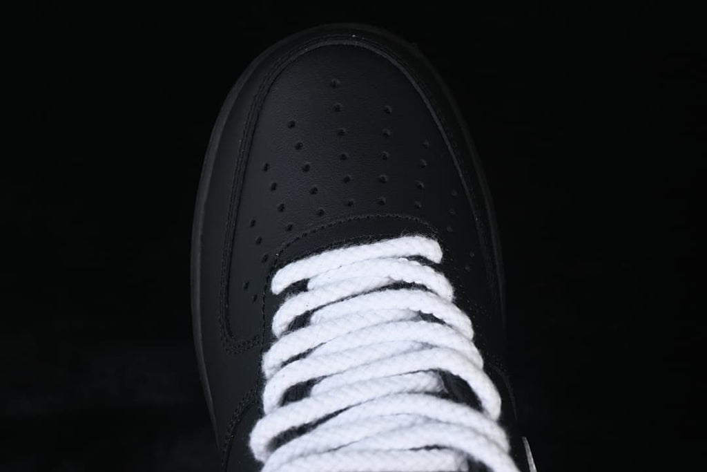 Top view of the perforated toe and white laces