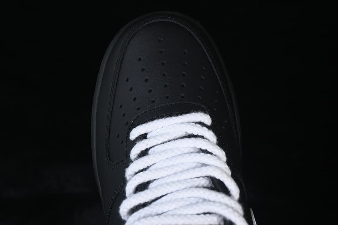 Top view of the perforated toe and white laces