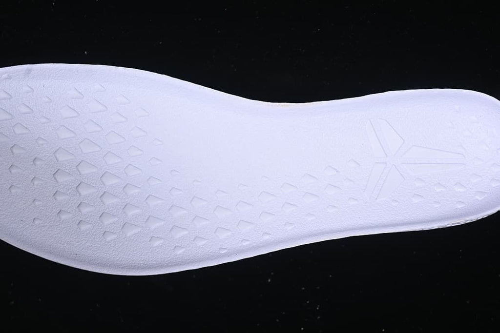 Close-up of textured white insole surface