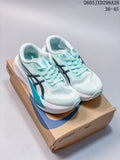 Pair of mint ASICS MAGIC SPEED 4 running shoes on a shoebox