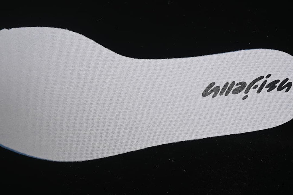 Close-up of a light-colored shoe insert with Jellyfish branding.