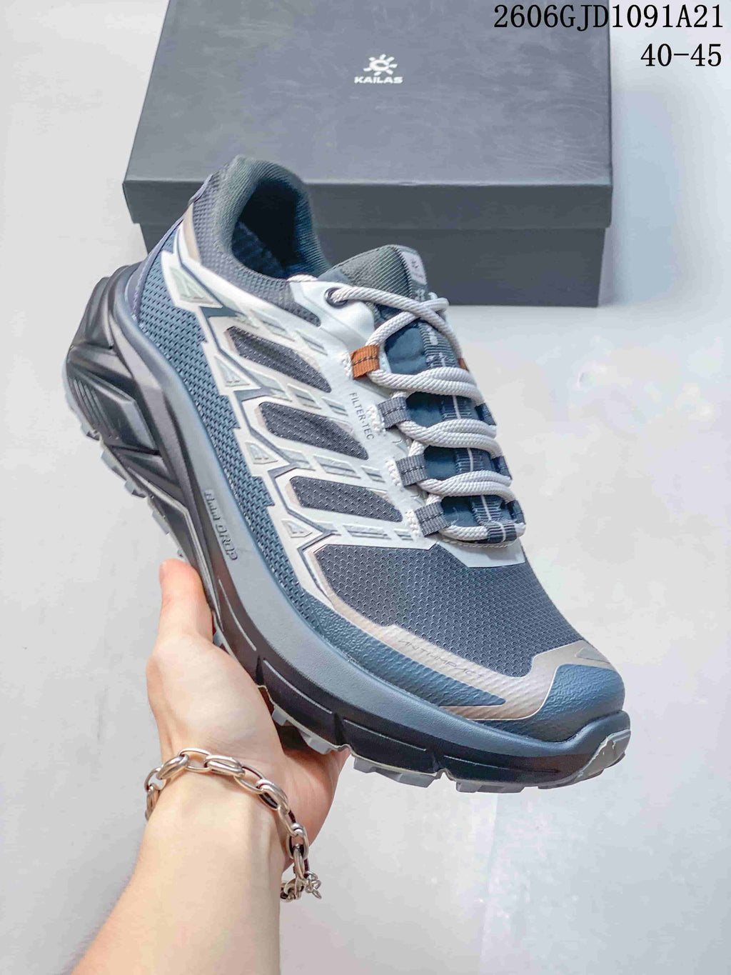 Angled side view of the shoe showing the upper, overlays, and outsole