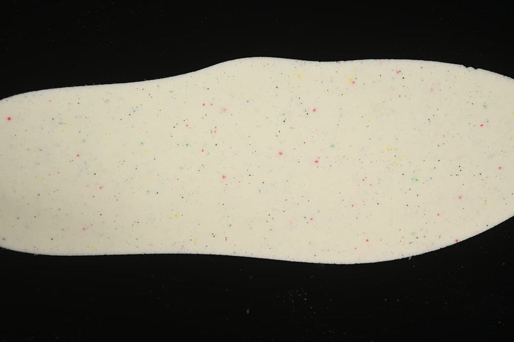 Cream-colored insole with small multicolor speckles