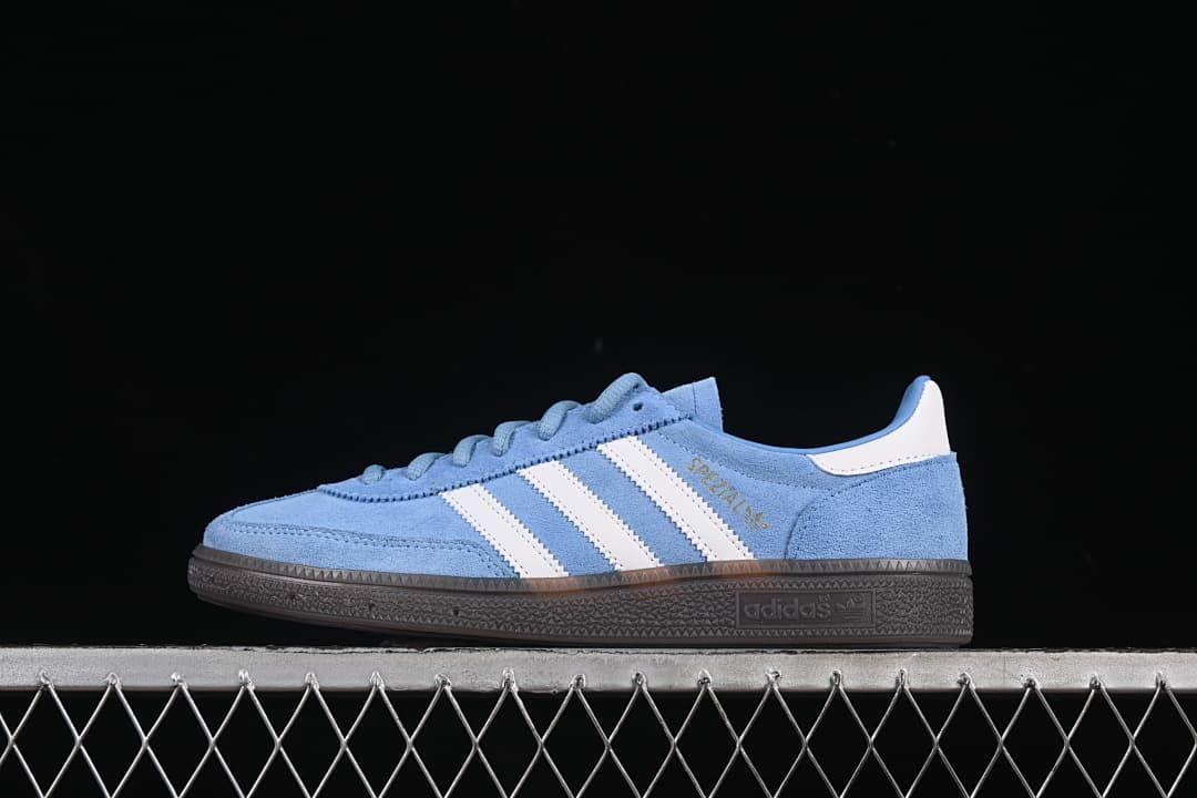 Side view of a blue and white adidas Handball Spezial sneaker