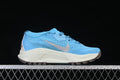 Side view of a blue Nike ACG Zegama Trail shoe with a light-colored Swoosh and lugged outsole.