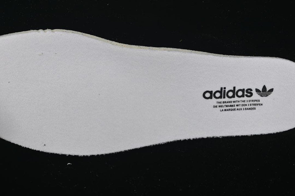 White insole with adidas branding