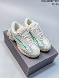 Pair of cream Raf Simons Cylon-21 sneakers with green and gray-blue accents