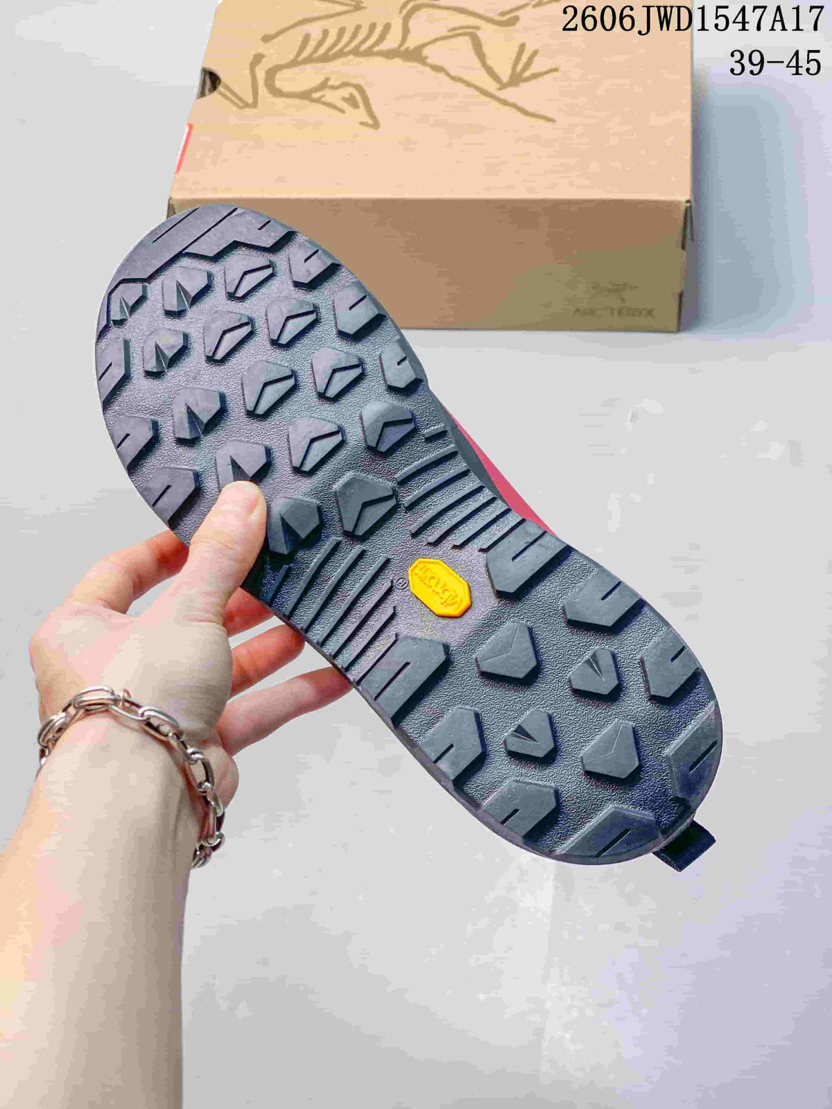 Close-up of the shoe's lugged outsole and tread