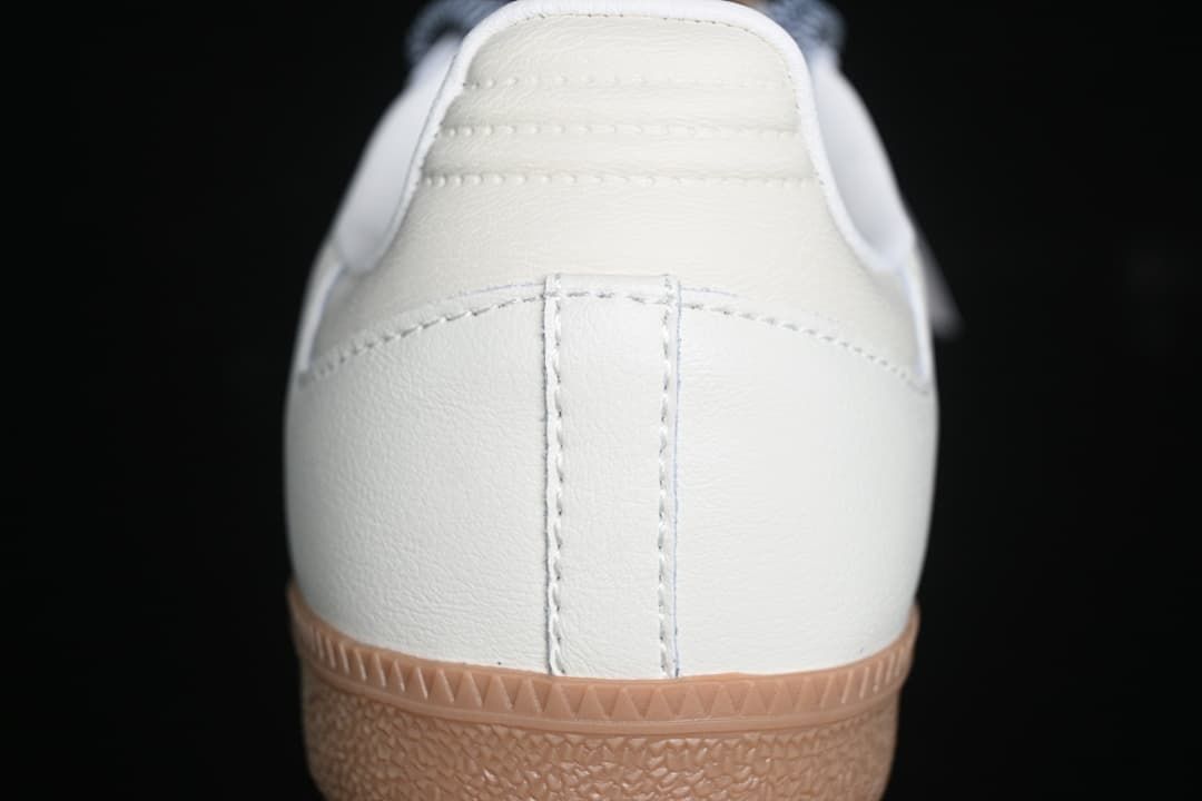 Close-up of the white heel and gum-colored outsole.
