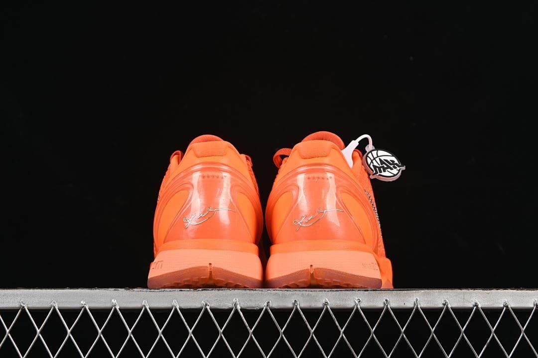 Rear view of both orange shoes