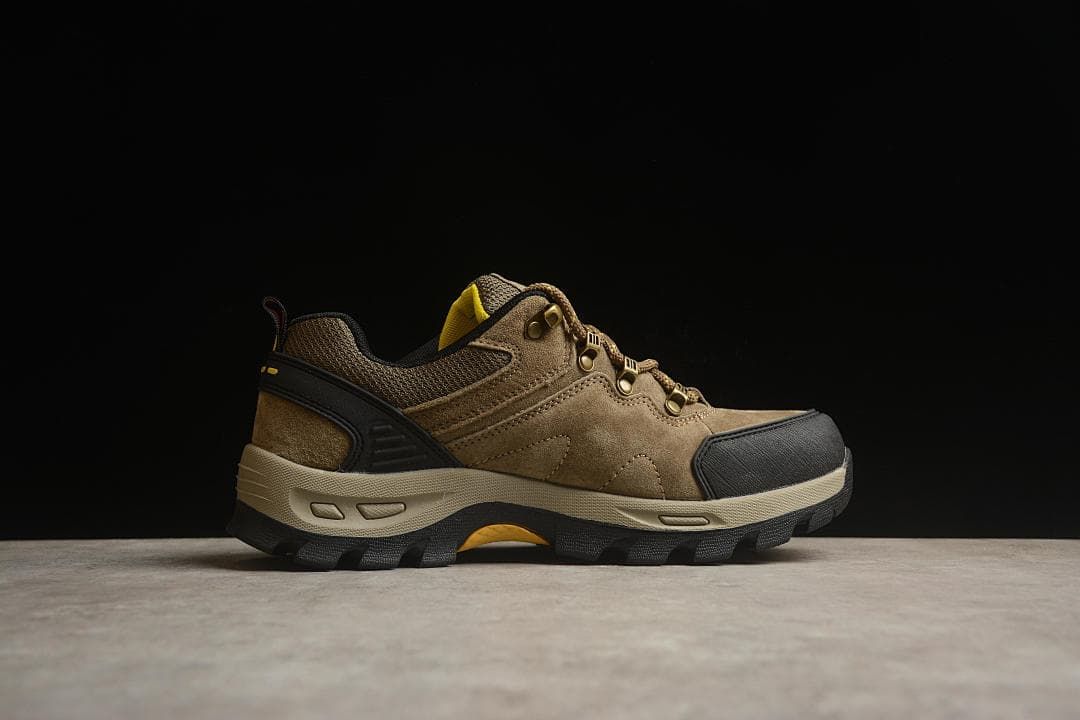 Side profile showing the shoe's layered design and lugged outsole