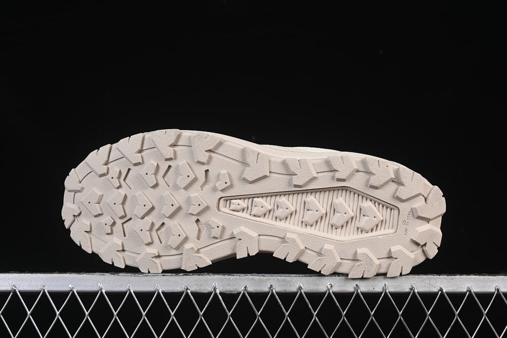 Underside view showing the patterned tread on the outsole