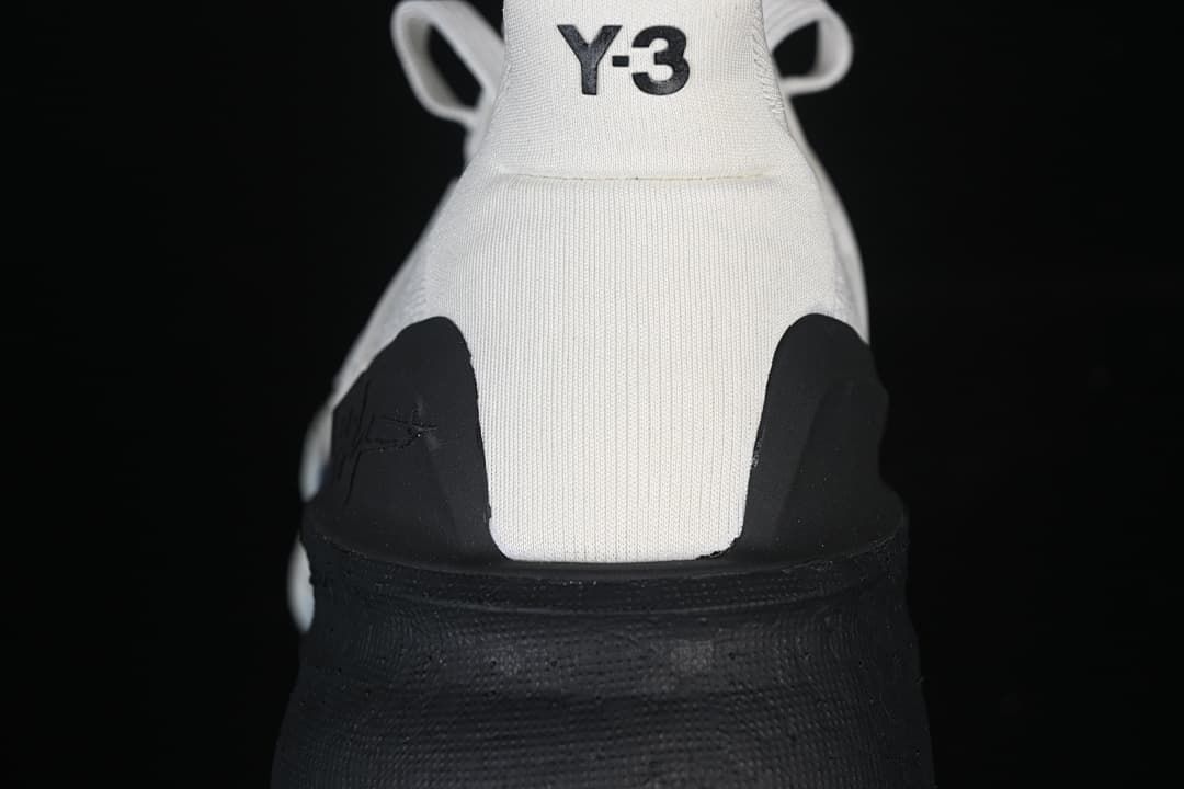 Rear view of the shoe with Y-3 heel branding and black heel panels