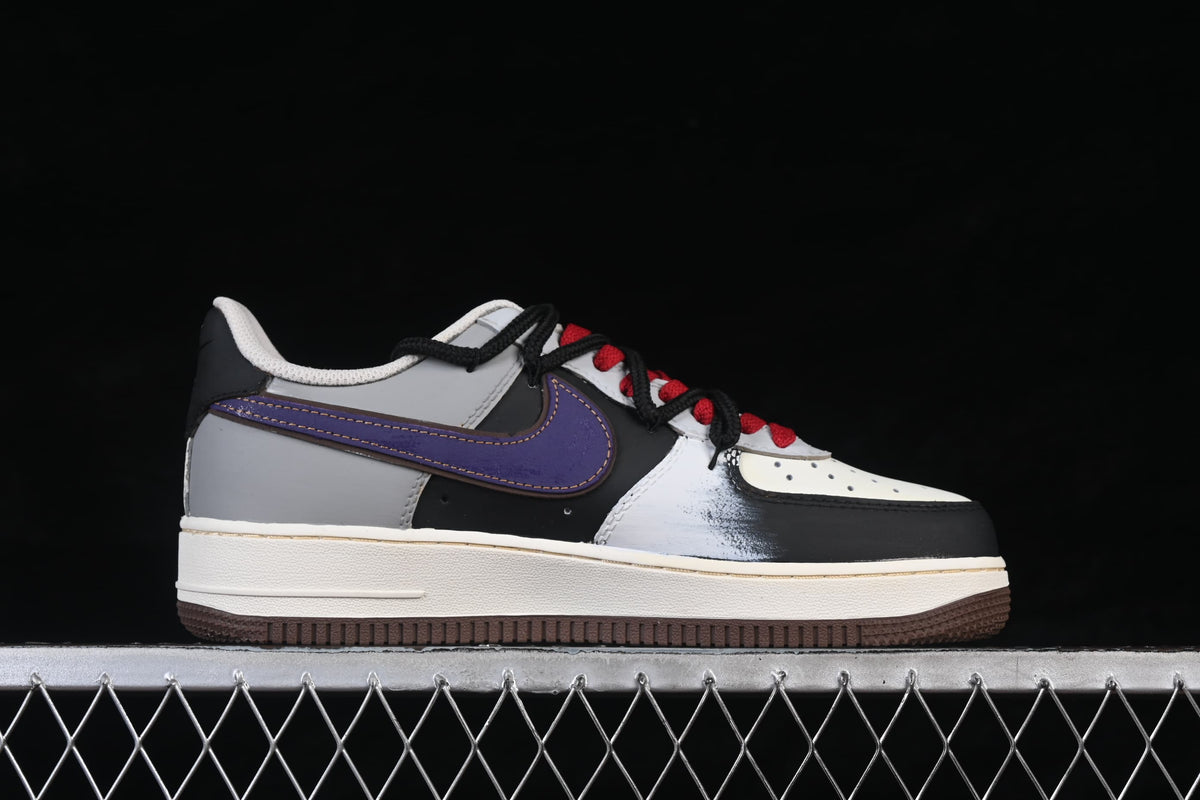 Outer side profile of the low-top sneaker with purple Swoosh and brown outsole