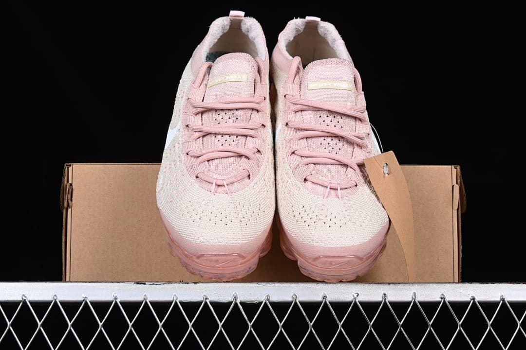 Front view of the pair displayed on a shoebox.