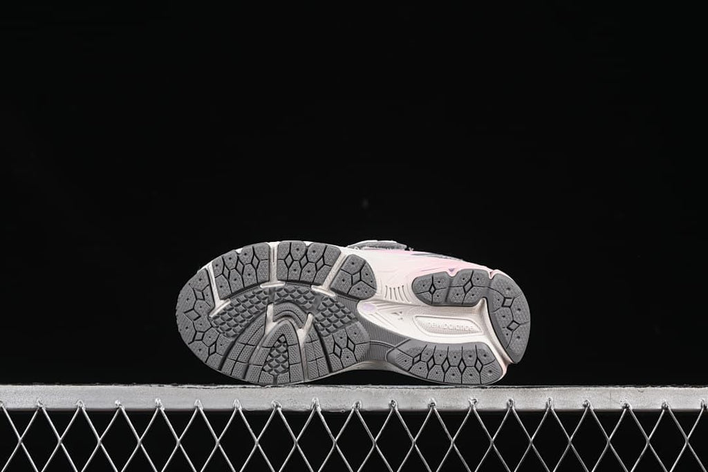 Underside view showing the patterned outsoles.