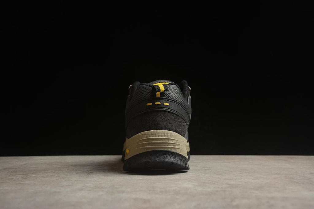 Rear view of the shoe showing the heel, pull tab and contrasting beige midsole.