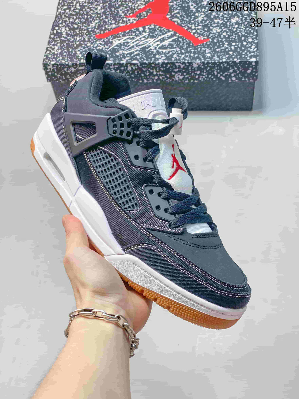 Close-up side view of a dark navy Jordan Spizike Low sneaker
