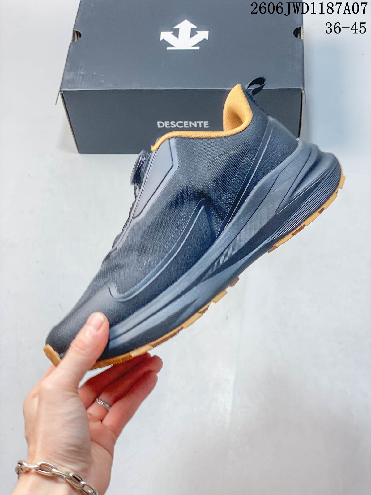 Side profile of the dark navy trail shoe with mustard-yellow outsole accents