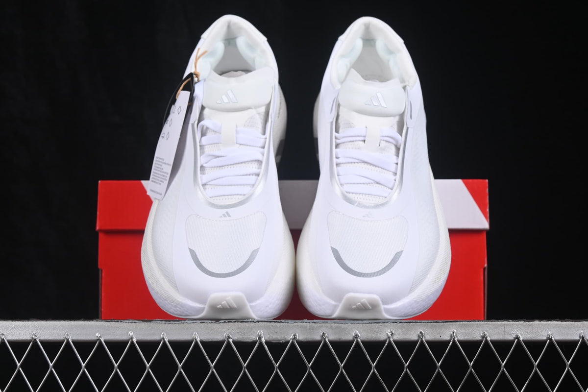 Front view of the pair showing the white toe boxes, laces, tongues, and silver curved accents.