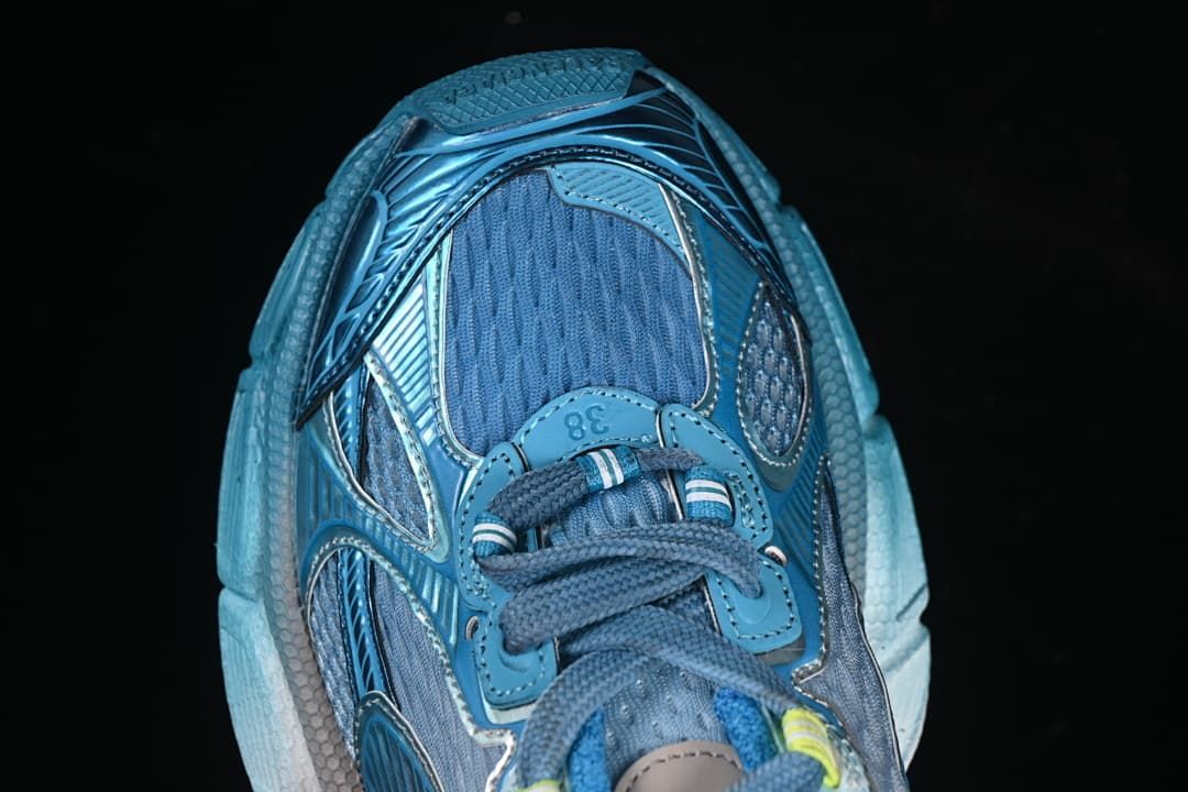 Top-down close-up of the sneaker toe and laces