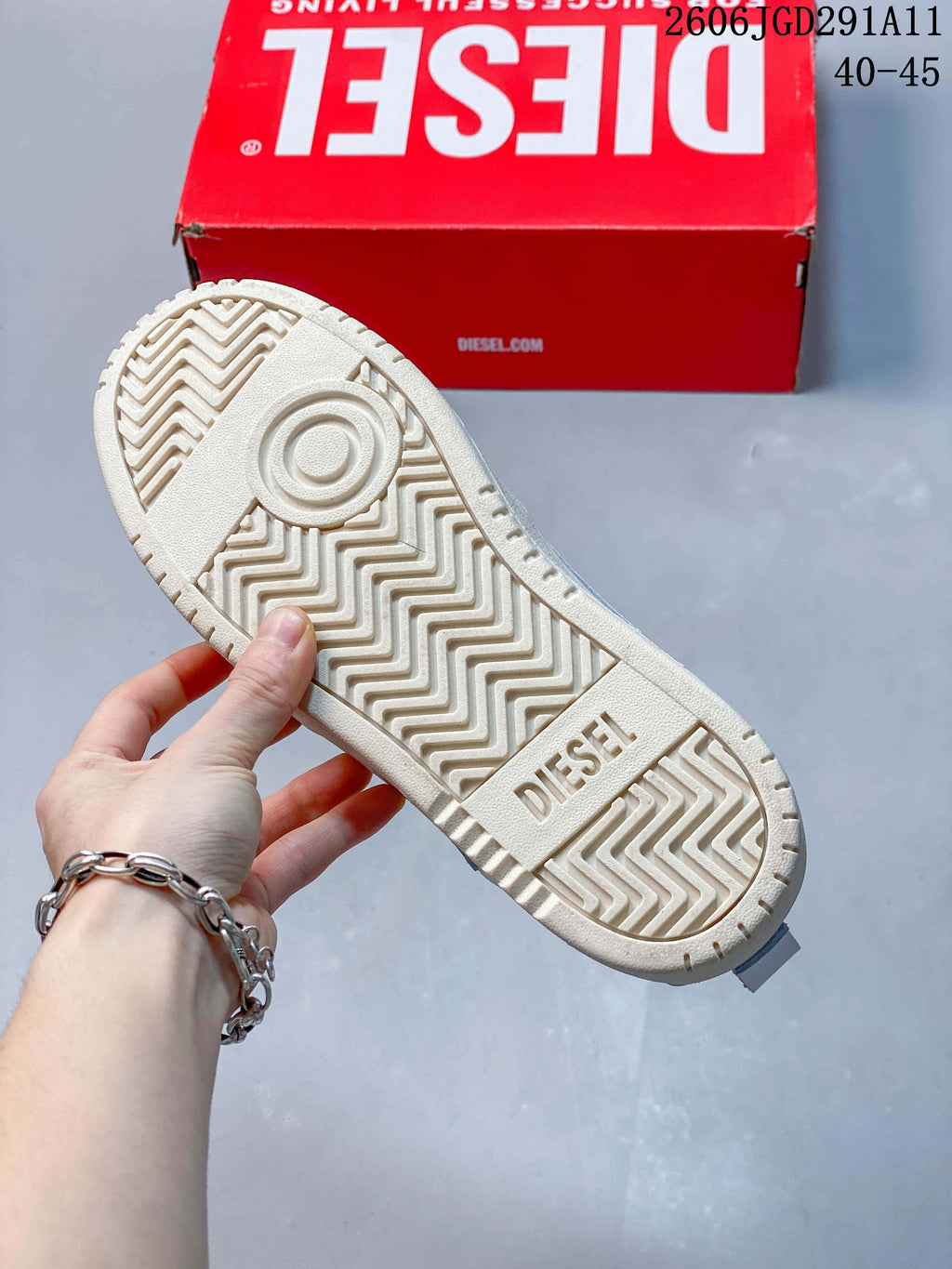 Close-up of the patterned outsole with Diesel branding.
