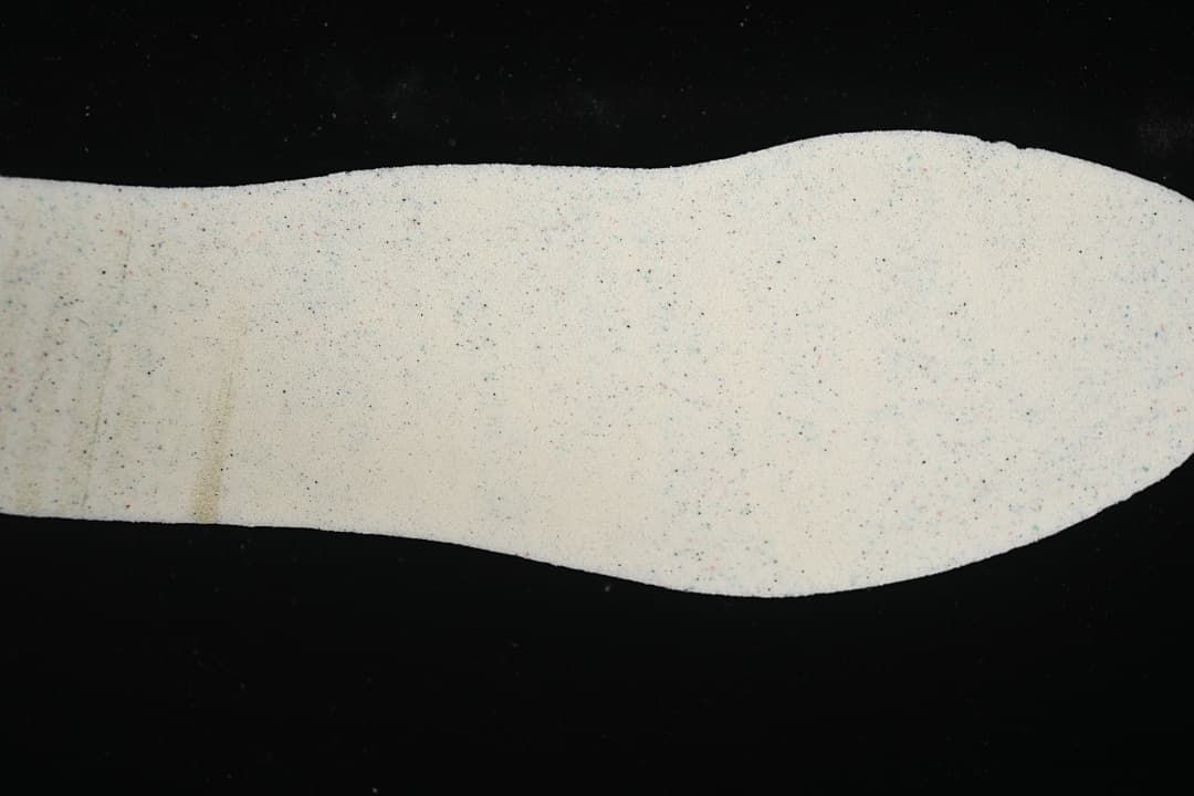 Close view of a light-colored shoe insole