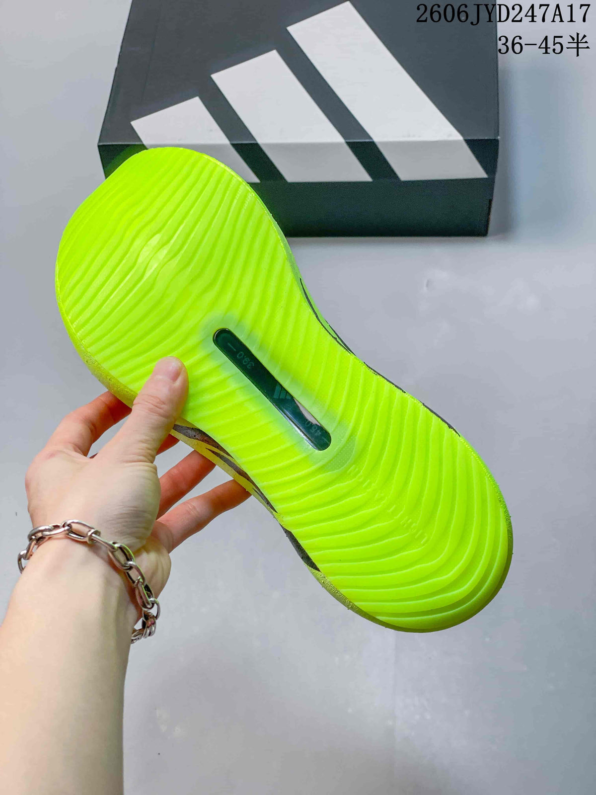 Textured neon yellow outsole with a central inset
