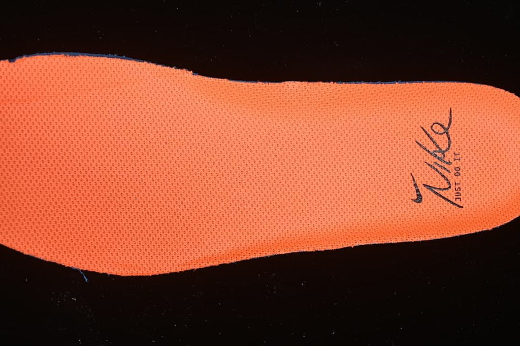 Orange shoe insert shown close up