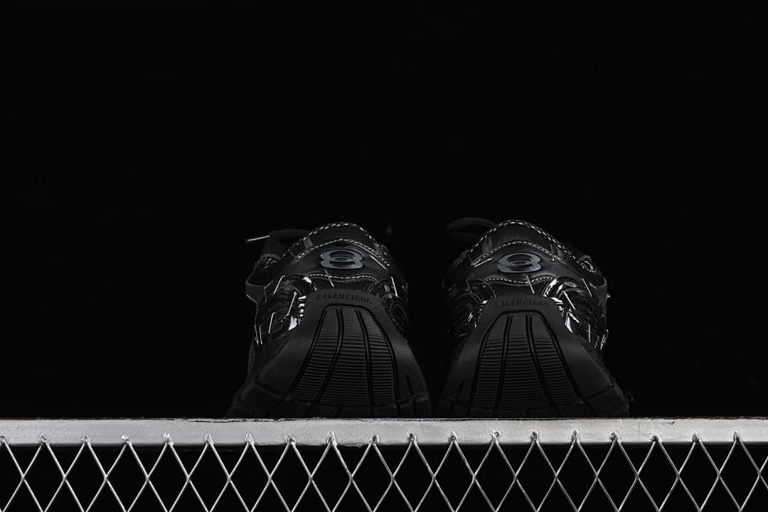 Rear view of the pair showing heel details and sole shape.