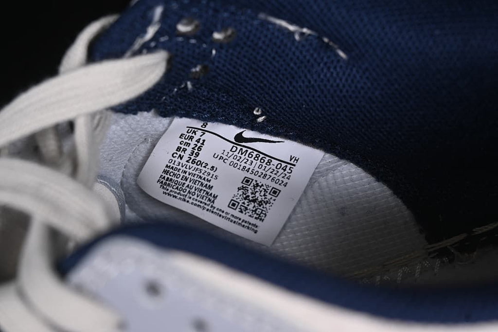 Close-up of size label showing EU 41 and style code DM6868-045