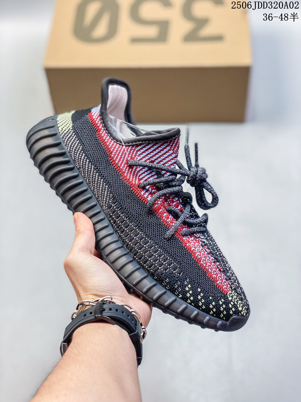 Black, red and gray Adidas Yeezy-style sneaker