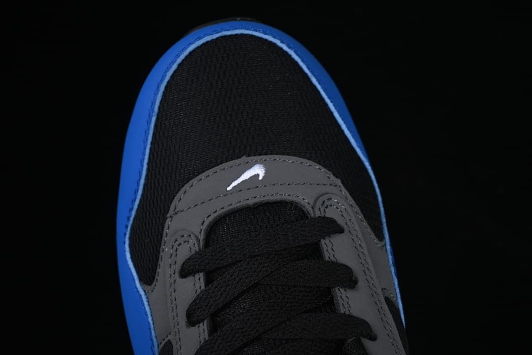 Top-down close-up of the black toe and lace area