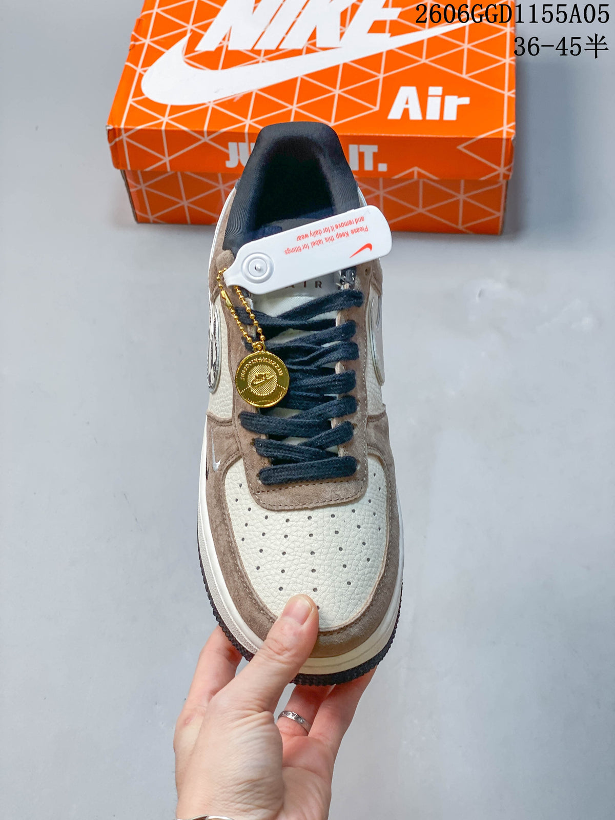 Top view showing the perforated toe, dark laces, and lace charm