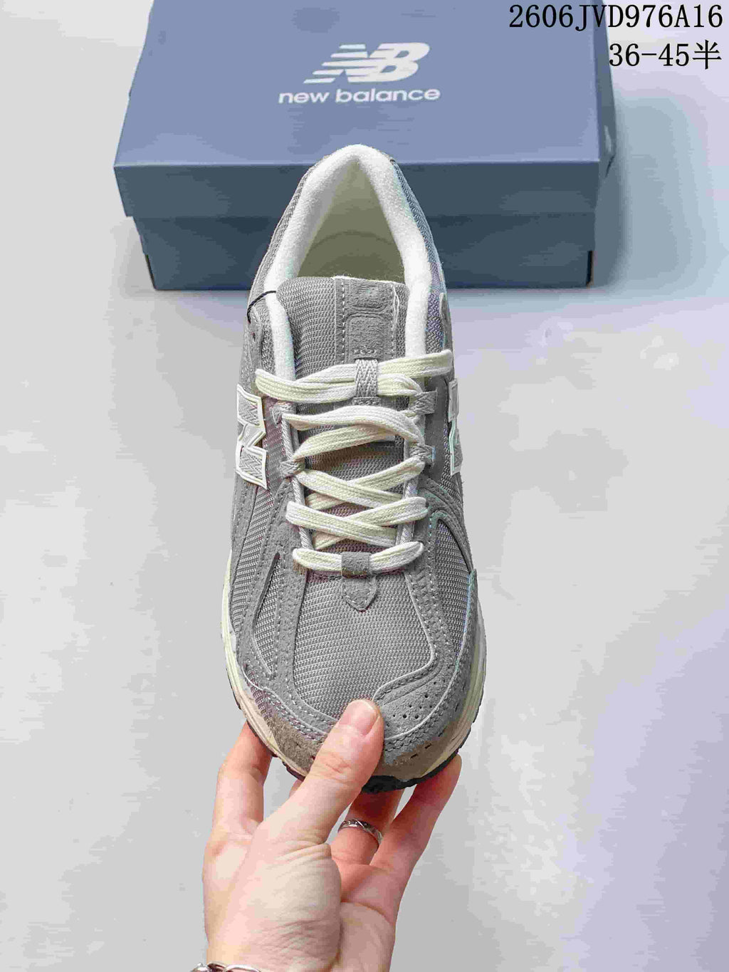 Top view of a grey lace-up sneaker.
