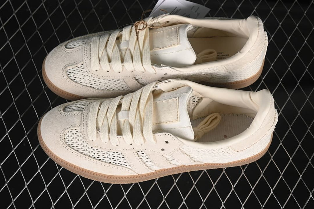Pair of cream Samba OG sneakers with gum-tone soles shown from above.