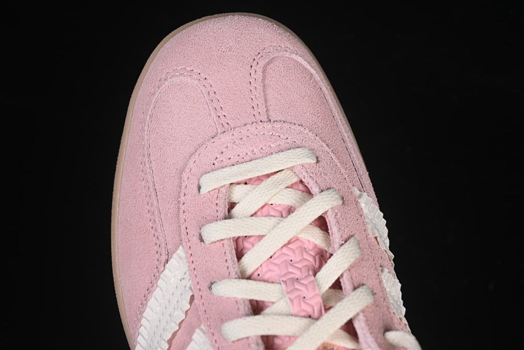 Top-down close-up of the pink toe and lace area