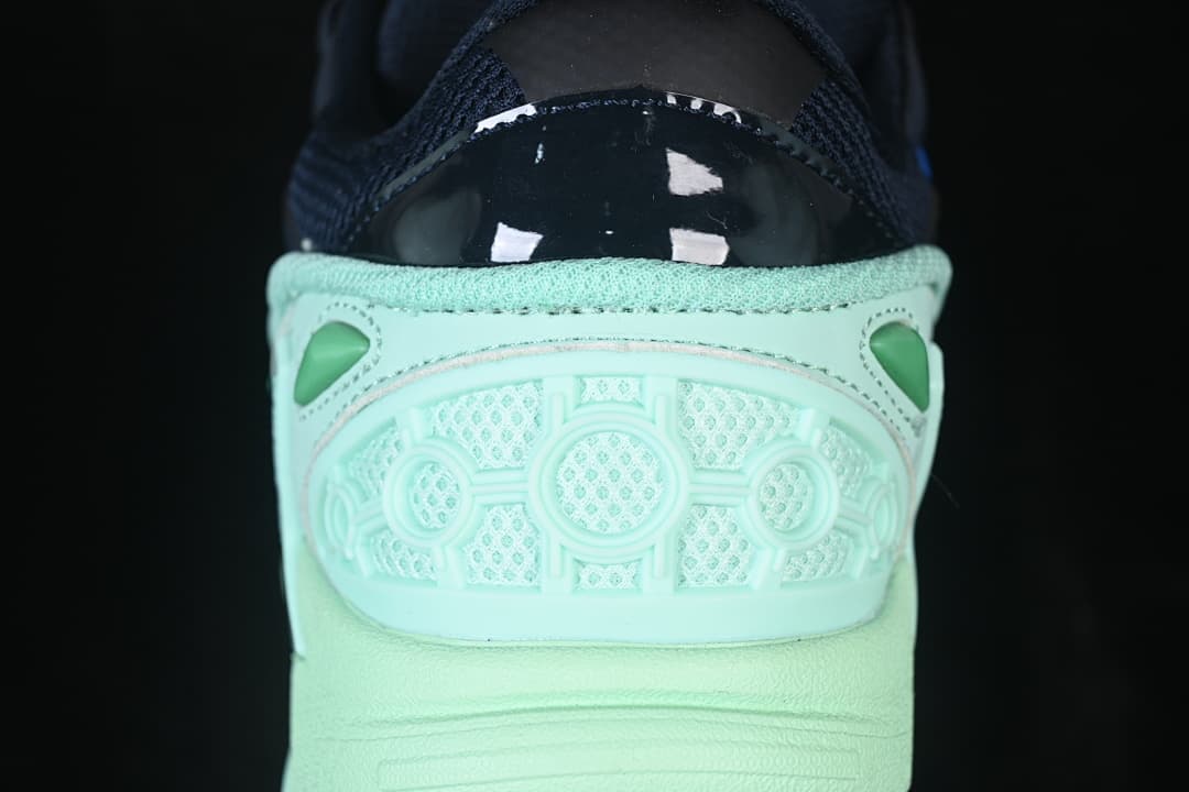 Rear close-up of the mint heel panel and sculpted detailing