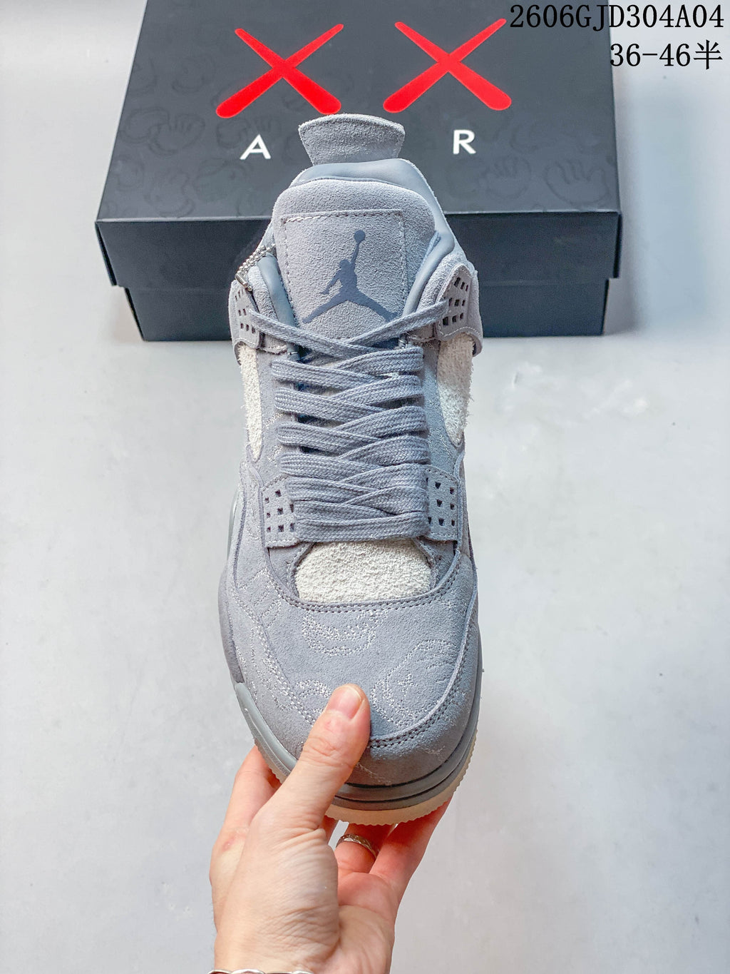 Front view showing the laces, tongue, and light-colored panels