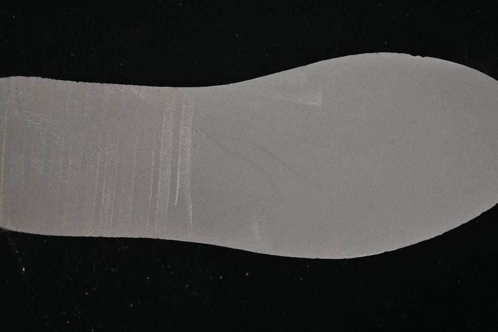 Close-up of the red outsole tread